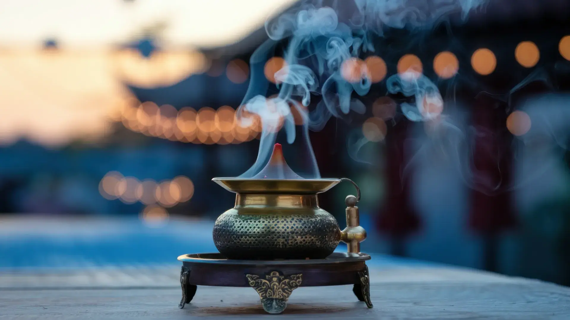 Brass Incense Burner With Rising Smoke Warm Bokeh Cropped